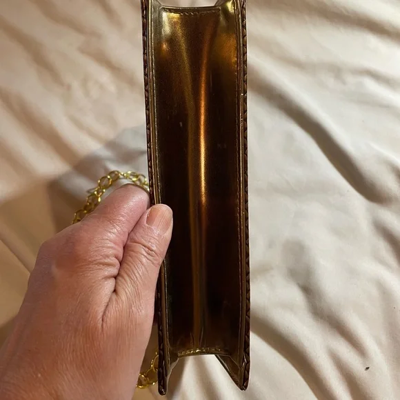 Bellini Gold Textured Clutch with Gold Chain and Bow Detail, OS - Picture 10 of 15